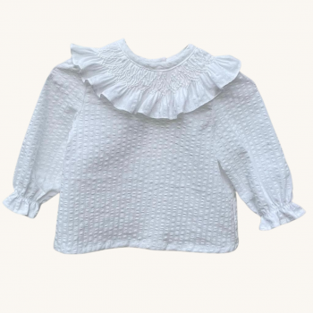 Blusa Bebé Blanca cuello nido